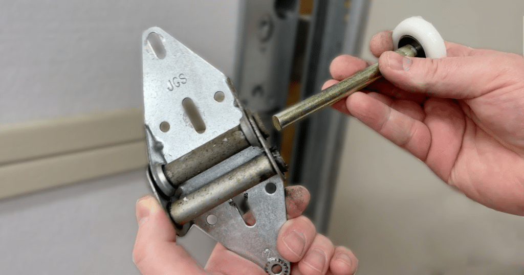 Broken garage door hinge